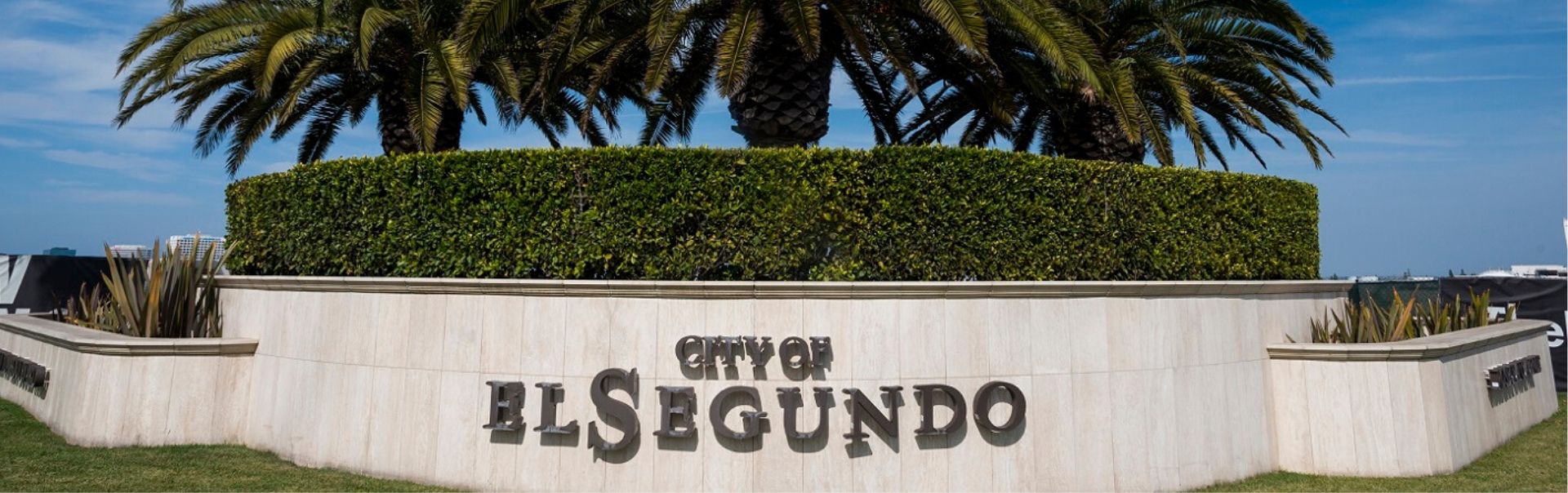 City of El Segundo Welcome sign w trees